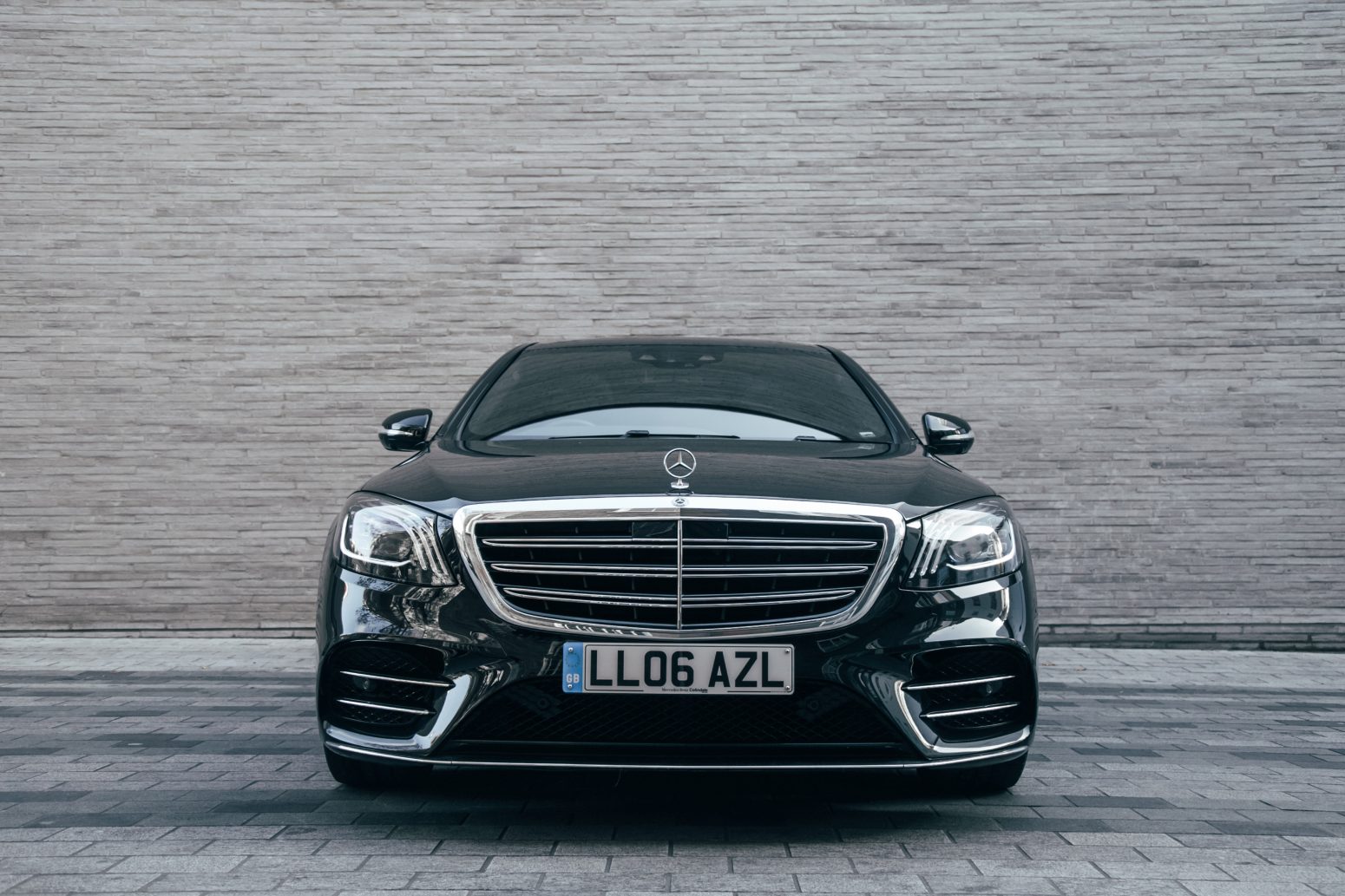 Front angle of AZ Luxe's Mercedes S Class, highlighting its presence in urban London setting
