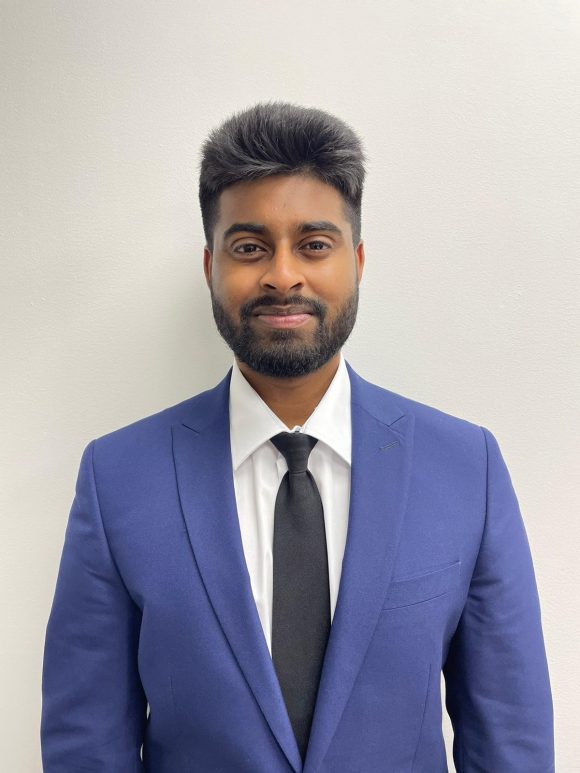 Portrait of Thanushan Thavarasa, skilled chauffeur at AZ Luxe