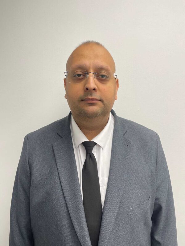 Portrait of Mubeen Lotta, skilled chauffeur at AZ Luxe